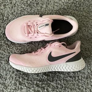 Nike Revolution running shoes. 4.5 Youth. 6 Womens.